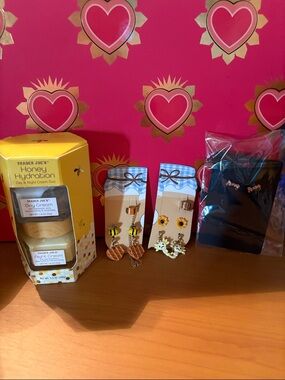 Trader Joe's Honey Hydration Day & Night Cream Duo and earrings